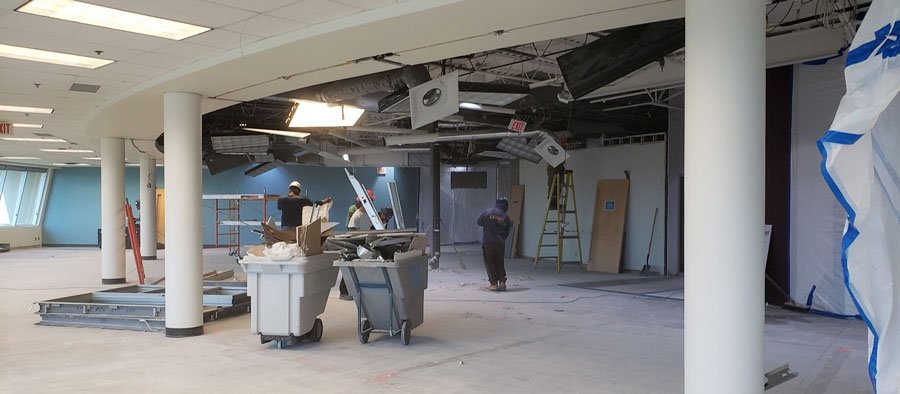 Post-construction cleanup team in a newly renovated home