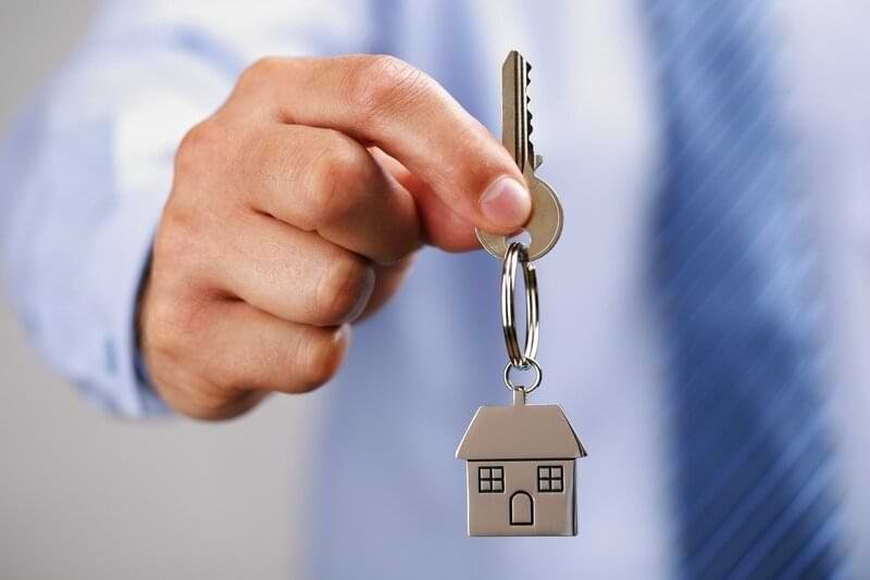 Professional residential house cleaning service in Toronto cleaning a modern living room